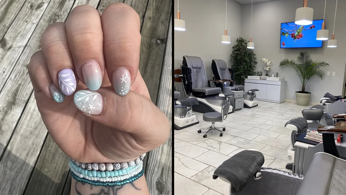 Manicured nails with glossy polish and fine nail art.